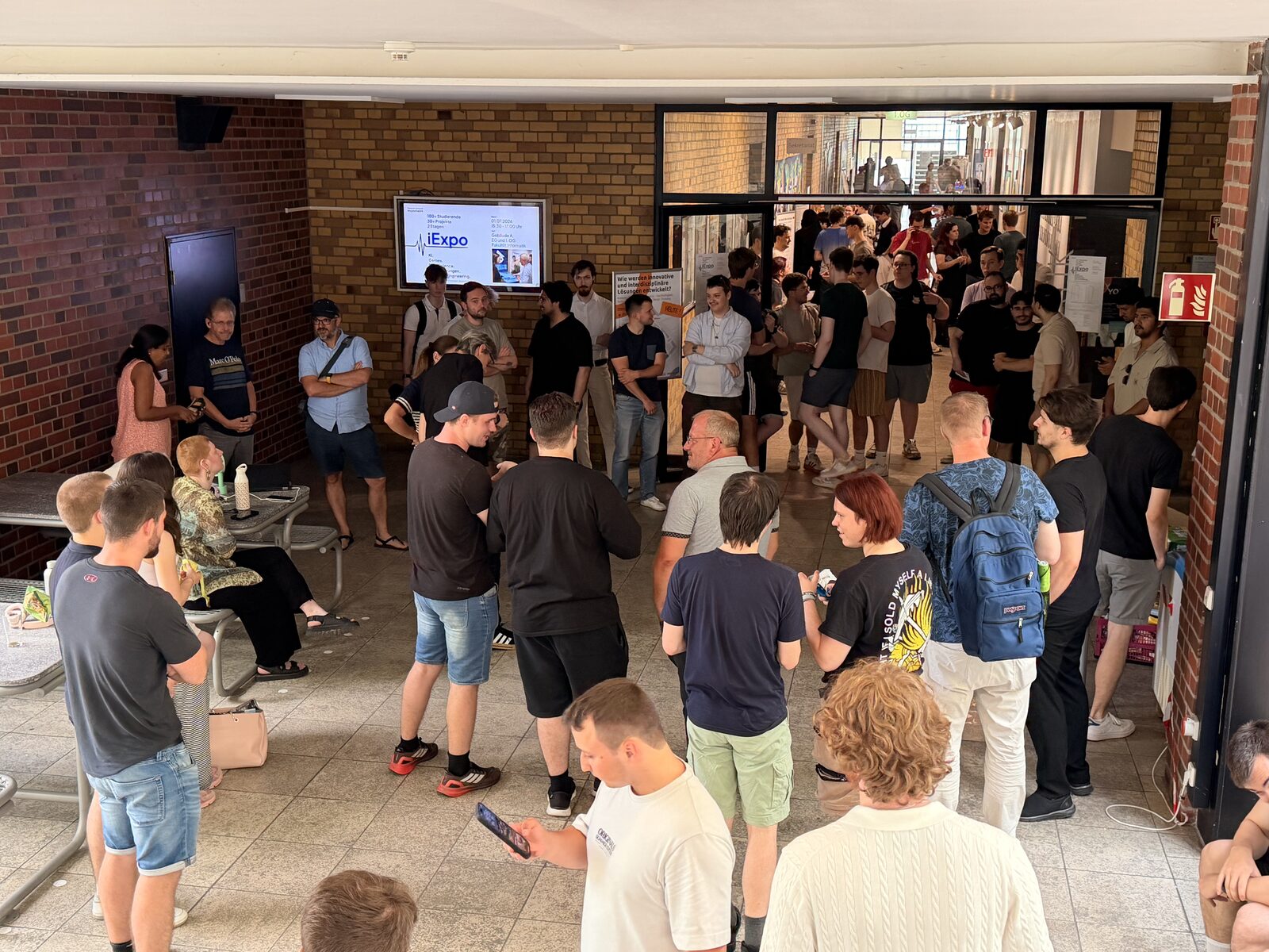 Full house at the iExpo in Building A — 180+ students and 30+ projects across two floors.
